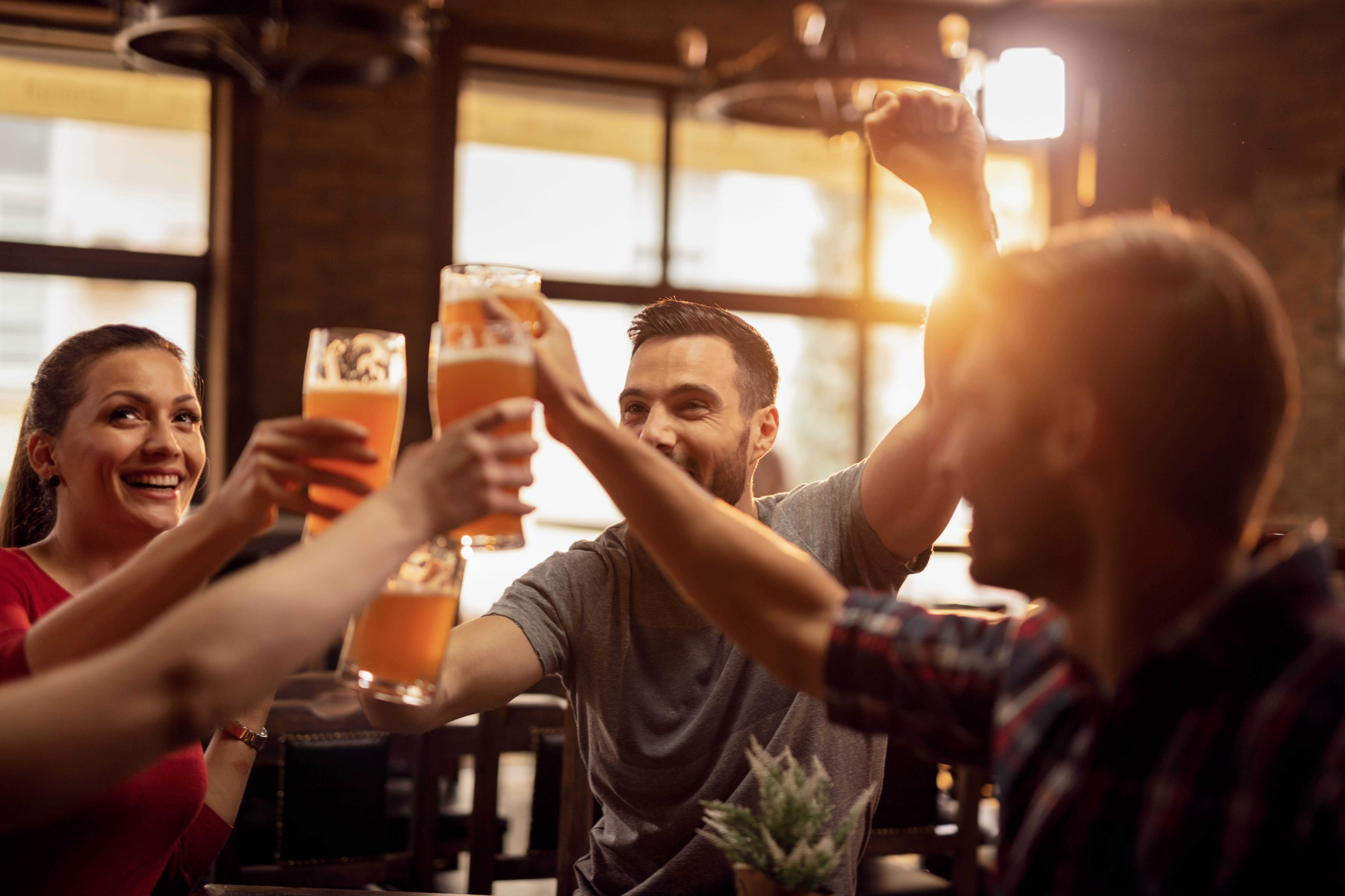 people celebrating in a pub